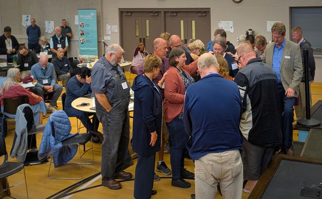 Circle of COD members praying over Roberta Vriesema
