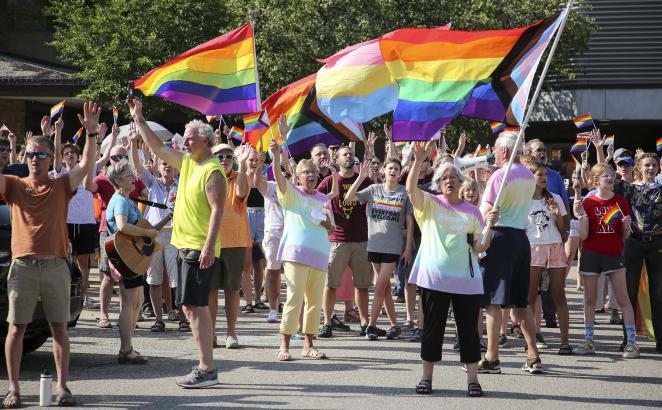 Synod 2022 Delegates Find Crowd of LGBTQ Allies Outside Their Session