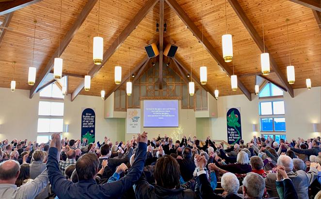 Congregants in worship at Faith Community Christian Reformed Church.