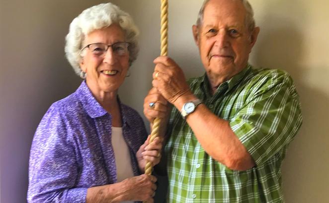 First CRC in Orange City, Iowa, has the only active church bell in the city. Henry and Joyce Dysktra were two of the congregation members who shared in ringing it a total of 150 times July 14.