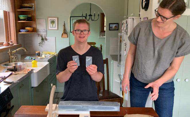 Simon Vanderloo displays freshly cut bars of handmade soap, with his sister, Caroline Short.