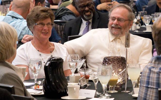 Norma and Gary Bekker (center) at the Synod 2019 banquet recognizing Gary’s retirement.
