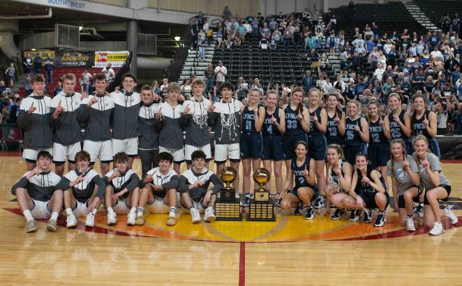 Lynden Christian High School’s boys and girls basketball teams after their championship wins.