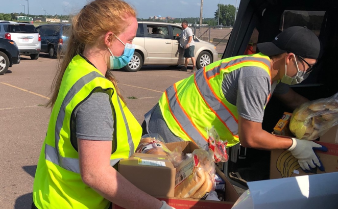 The Bethel CRC SERVE@Home team participated in a drive-thru style food giveaway at Faith Temple in Sioux Falls, S.D. 