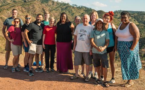 Carol Van Ess-Dykema (center, in red) is pictured with the group of Global Volunteer Program participants with whom she journeyed to Honduras to learn about sustainable urban development in the country and the ongoing work of World Renew.