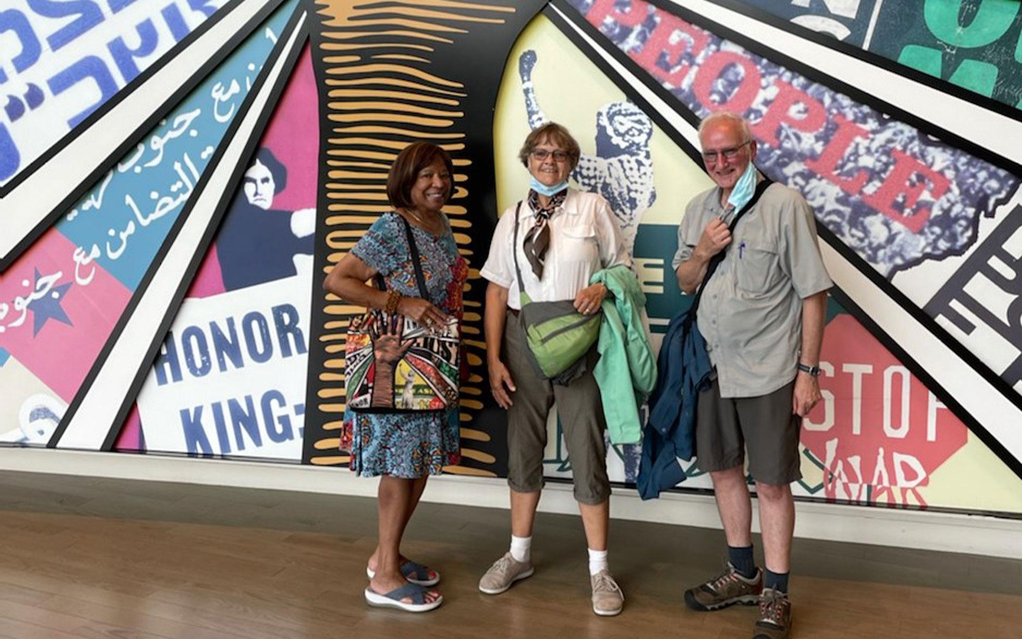 Wynanda and Gus Polman stand with Deborah Richardson at the National Center for Civil and Human Rights in Atlanta, Ga.