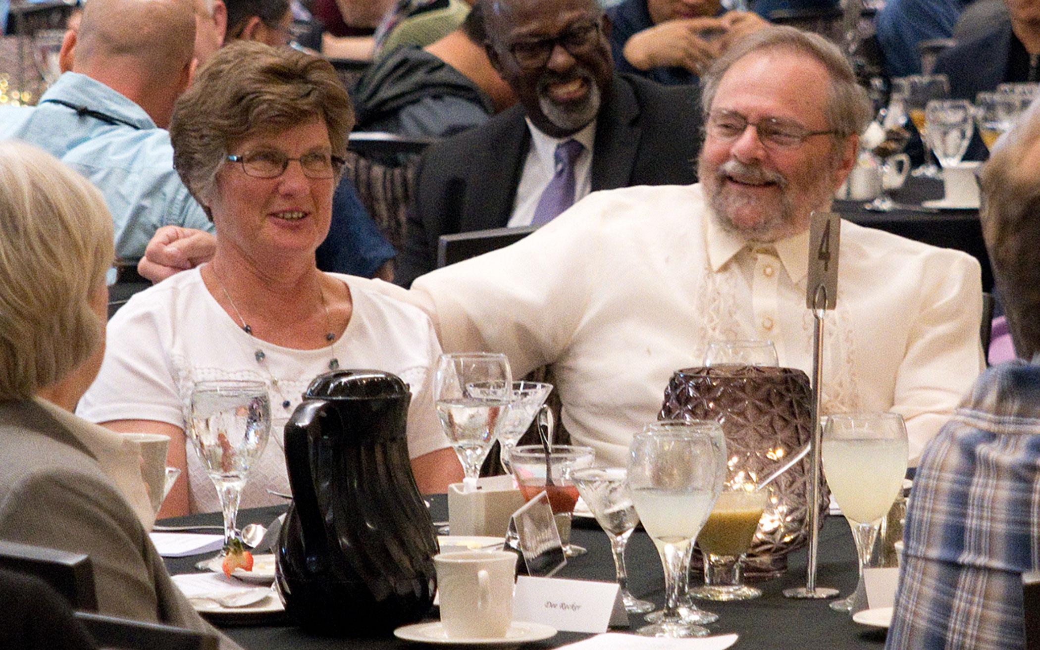 Norma and Gary Bekker (center) at the Synod 2019 banquet recognizing Gary’s retirement.
