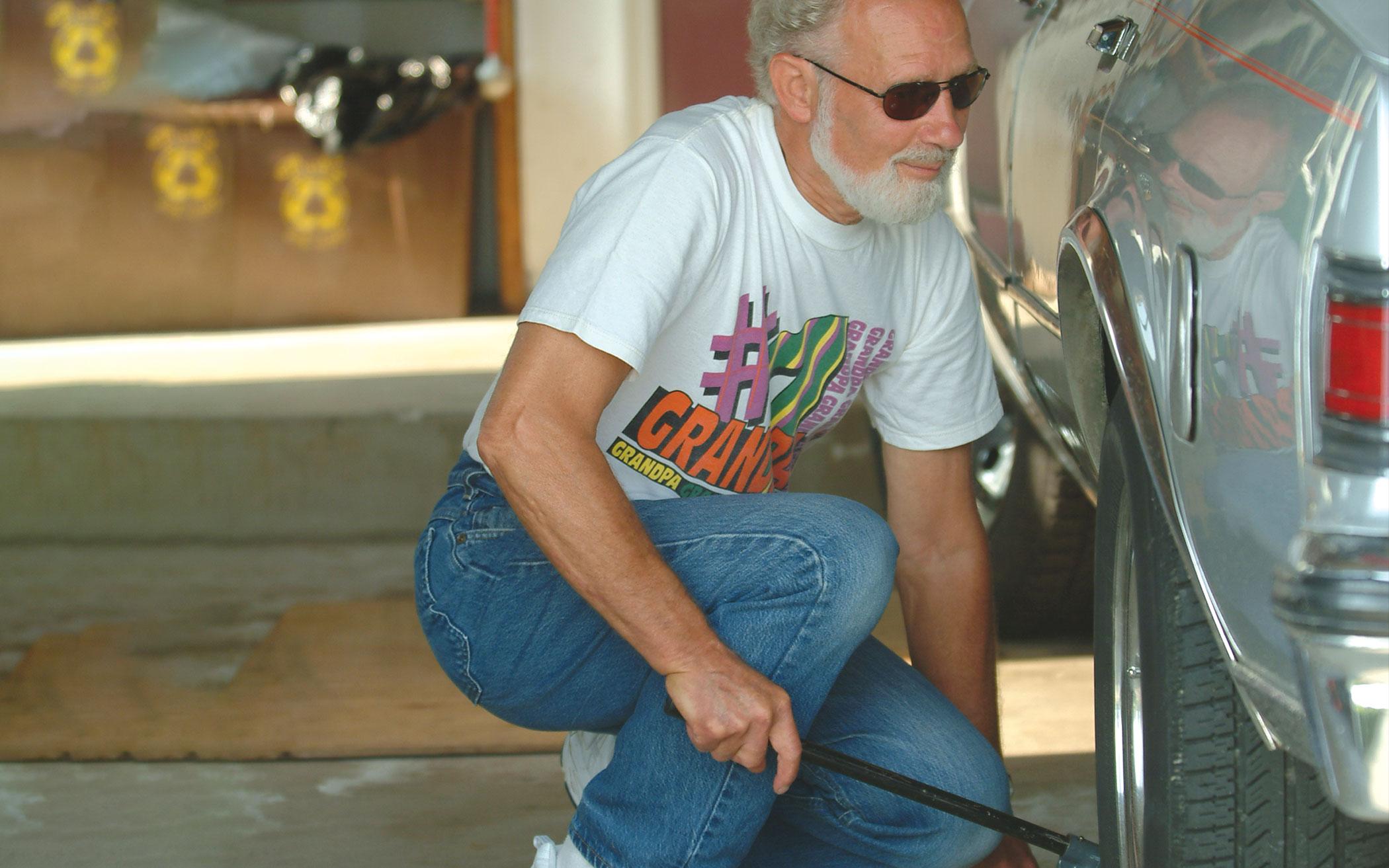 Jim Vanderlaan, at work on his car.