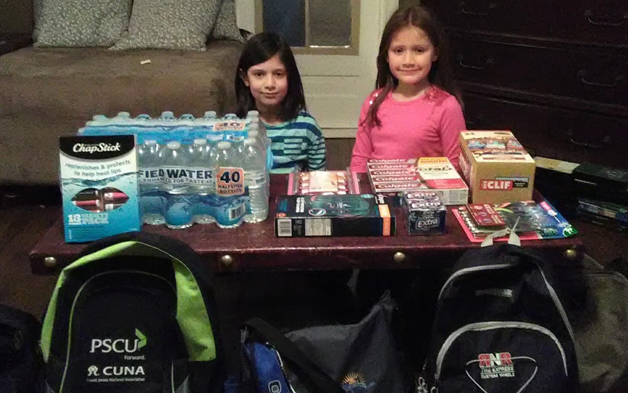 Veronica (l) and Hannah Gross with their Love2Go bags.