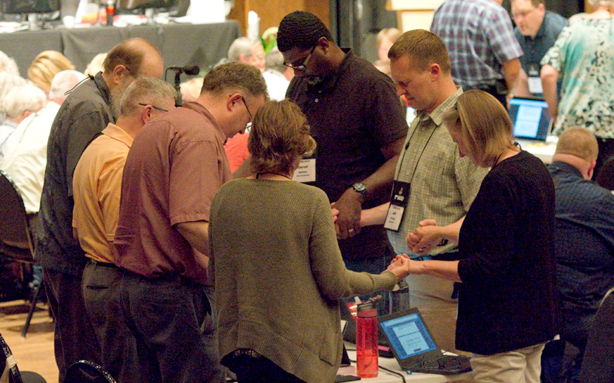 Delegates stopped often to pray.