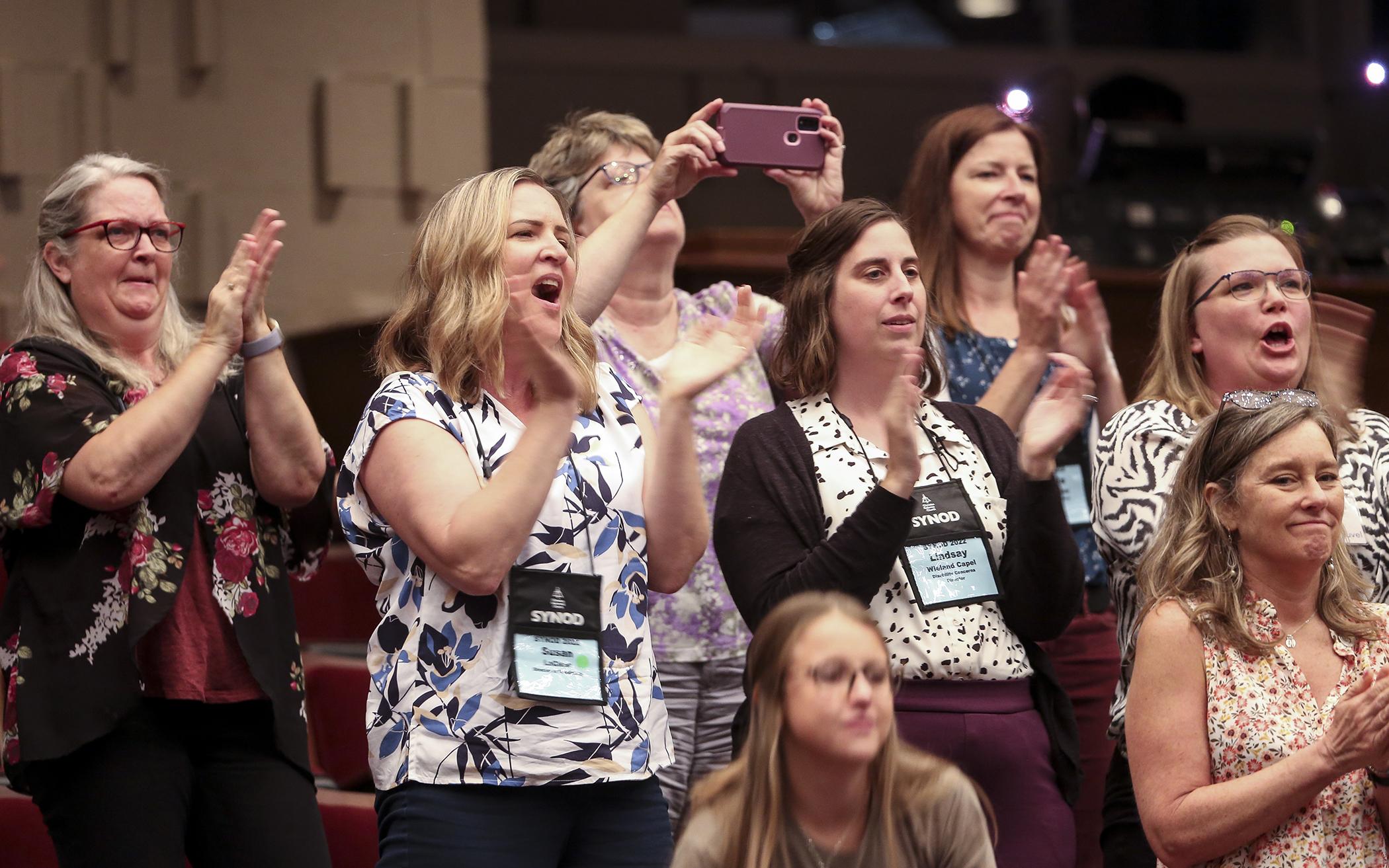 Women pastors in the auditorium applauded the 25th anniversary of women’s ordination in the Christian Reformed Church.