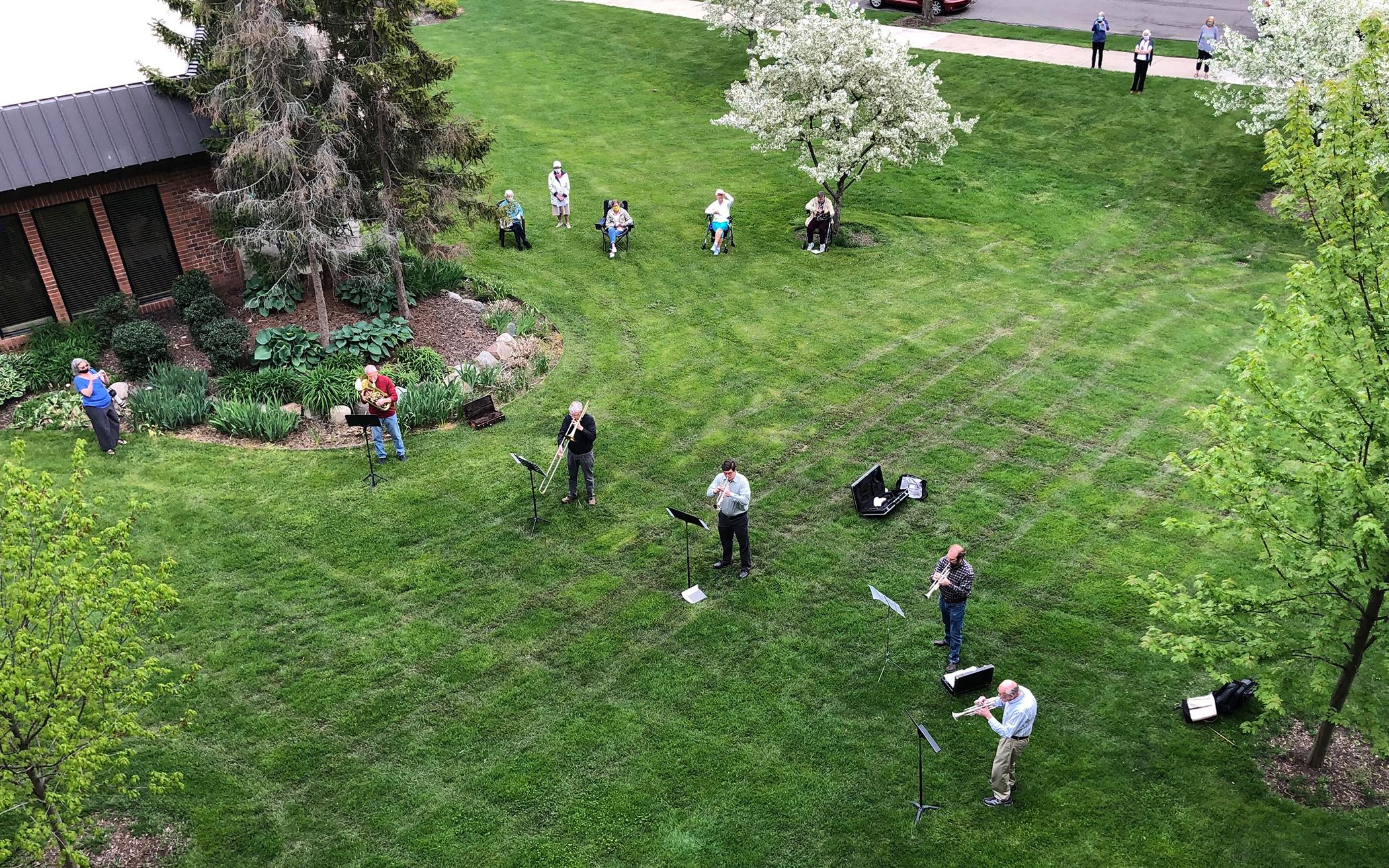 Michigan Residents Worship From Their Balconies on Ascension Day